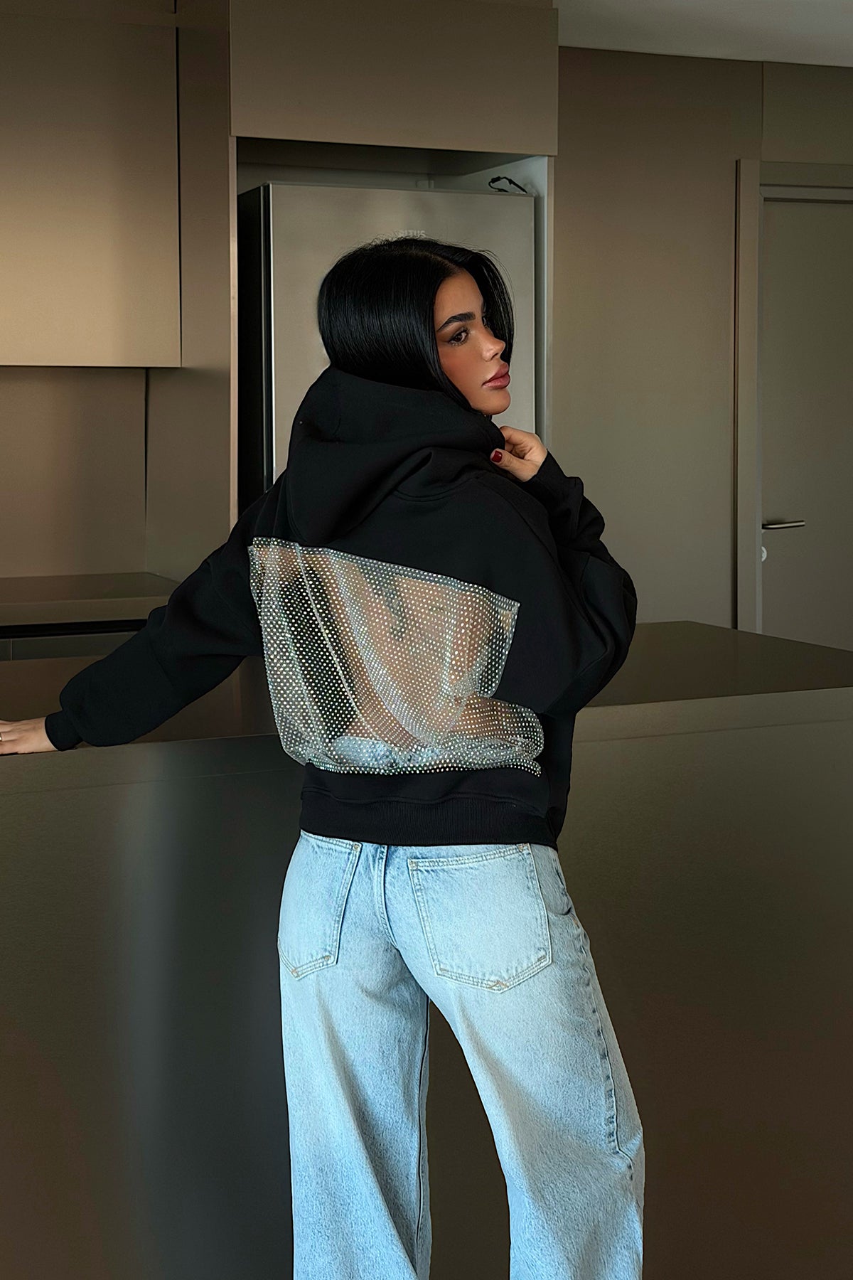 Black Hooded Sweatshirt with Stone Detail on the Back